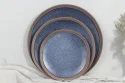 Color clay dinnerware in double reactive glaze
